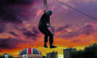 Then London Mayor Boris Johnson dangles on a zipwire as he publicises the Olympic Games in London in 2012. Added sunset:John Wilkie