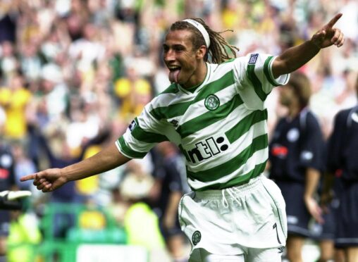 Henrik Larsson strikes a very familiar celebratory pose during his time in the hoops