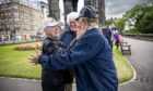 Vietnam veterans, from left, John Keaveney, Brian Thomson and Brian McAngus meet for the first time in Edinburgh 
on Monday, the Fourth 
of July;