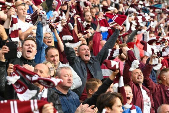 Hearts fans cheer on their side against FC Zurich