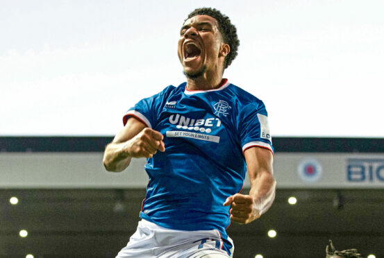 Rangers' Malik Tillman celebrates scoring to make it 3-0 during a UEFA Champions League Third Qualifying Round match between Rangers and Royale Union Saint-Gilloise at Ibrox Stadium.