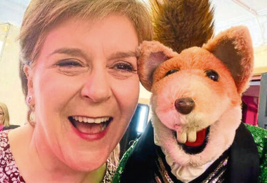 Nicola Sturgeon and Basil Brush.