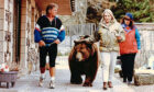 Andy and Maggie Robin take Hercules for a walk in 1994