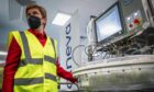 Nicola Sturgeon operates a cell expansion bioreactor during a 
visit to the Valneva plant in Livingston in March.