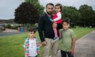 Omid Asak, with his children, Ahmad, Jebran and Maryiam