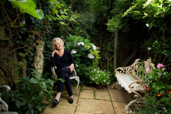 Hayley Mills relaxes in the garden of her west London home