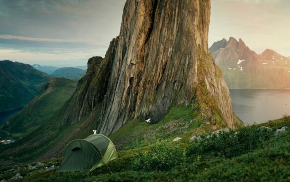 Campers get away from it all in the stunningly serene mountains of Senja, Norway, one of Emma Thomson’s Quiet Escapes