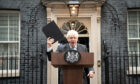Outgoing Prime Minister Boris Johnson addresses the media outside 10 Downing Street before leaving for Balmoral