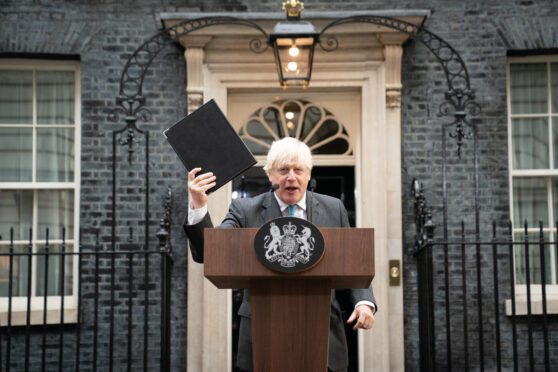Outgoing Prime Minister Boris Johnson addresses the media outside 10 Downing Street before leaving for Balmoral