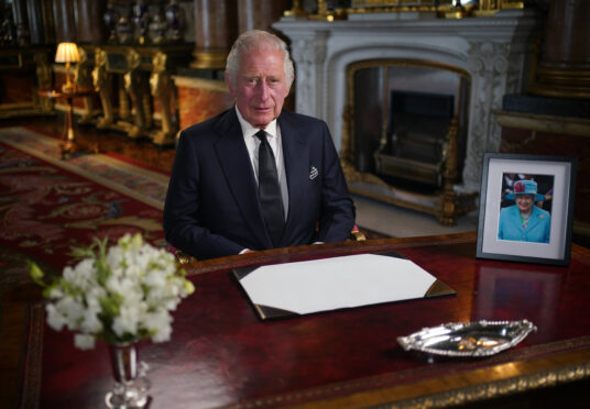 King Charles III delivers his address to the nation and the Commonwealth from Buckingham Palace