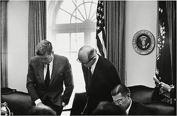 Left to right: U.S. President John F. Kennedy, U.S. Secretary of State Dean Rusk, U.S. Secretary of Defense Robert S. McNamara discuss the crisis at the White House
