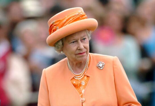 The Queen in hallmark bright coat and hat in Windsor in 2004