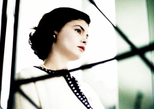 Actress Audrey Tautou wears a classic twinset while playing Coco Chanel in 2009 movie Coco Before Chanel.