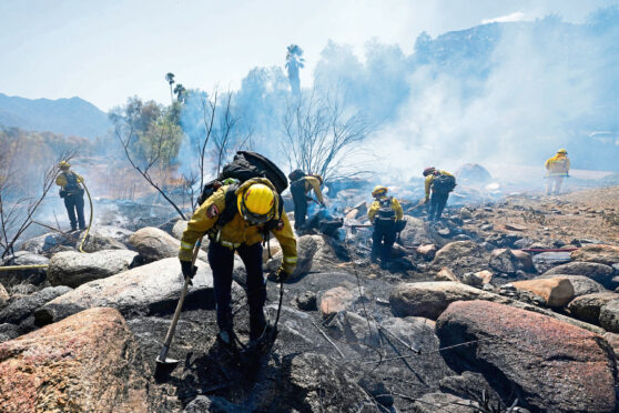 Fire crews battle the blaze.