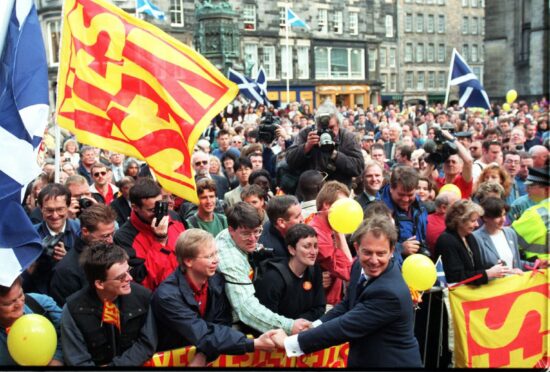 Prime Minister Tony Blair in Edinburgh’s Parliament Square celebrates the result of the Devolution Referendum in September 1997