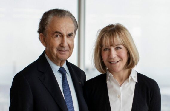 Billionaire Gerald Schwartz, left, with wife, Heather Reisman, another tycoon, is behind the agency recruiting nurses using a line made famous by Tom Cruise in the film Jerry Maguire