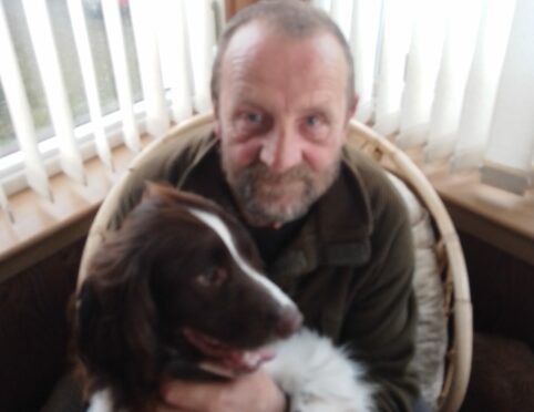 George Beaumont with his springer spaniel, Dougal.