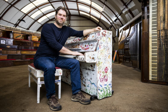 Tom Binns of Glasgow Piano City, who has created the UK’s first ever permanent auditorium made entirely from recycled pianos