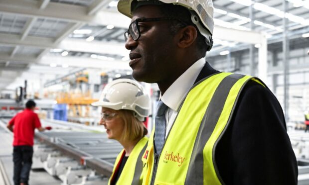 Prime Minister Liz Truss and Chancellor Kwasi Kwarteng visit a factory in Kent on Friday.