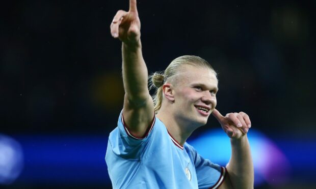 Erling Haaland celebrates in midweek