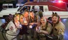 Laura Sneider, Graham Sneider, Simon Reay, Laura Reay, Chris Cathrine and Rich Young are pictured as a replica of Ghostbusters spectacular Ecto-1 Cadillac goes on show at Glasgow’s Riverside Museum