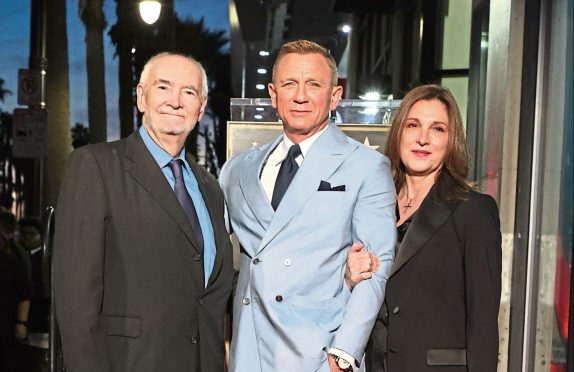 Michael G Wilson, Daniel Craig and Barbara Broccoli on the Walk Of Fame.
