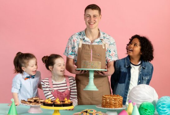 Bake Off star Peter Sawkins with budding bakers