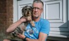 Andrew Cameron with dachshund Clyde at his East Kilbride home