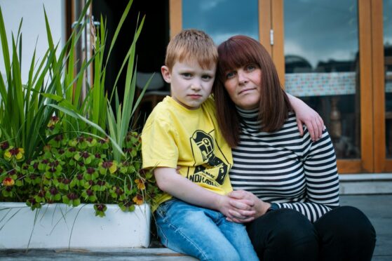 Murray Cameron at home with his mum Susan