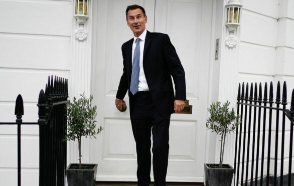 Jeremy Hunt leaves his home in London after being appointed Chancellor