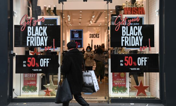 Shoppers make the most of Black Friday sales last year but it’s also a busy weekend for scammers