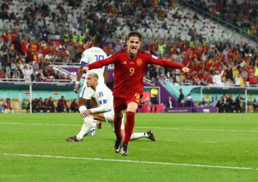 Spain's Gavi celebrates scoring against Costa Rica