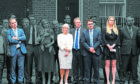 Joining his wife Carrie, aides and supporters line up behind Boris Johnson outside No 10 on July 7 as he announced his resignation as Prime Minister. Several are reportedly being given peerages in his resignation honours list: in colour from left to right, former minister of state Nigel Adams, ex-Culture Secretary Nadine Dorries, Scottish Secretary Alister Jack, former No 10 deputy chief of staff Ben Gascoigne and ex-Downing Street special adviser Charlotte Owen