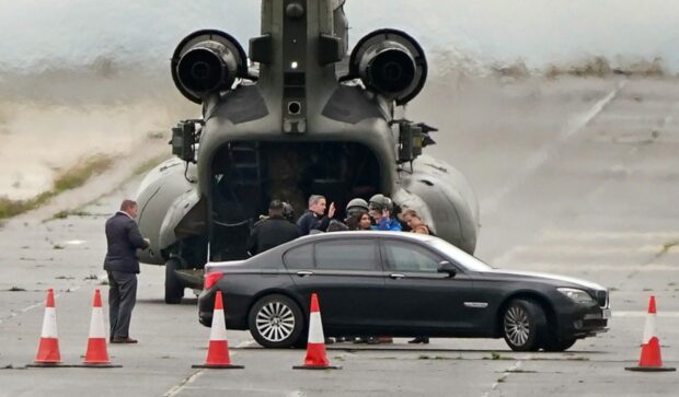 Home Secretary Suella Braverman arrives in a Chinook helicopter for a visit to the Manston immigration short-term holding facility located at the former Defence Fire Training and Development Centre in Thanet, Kent.