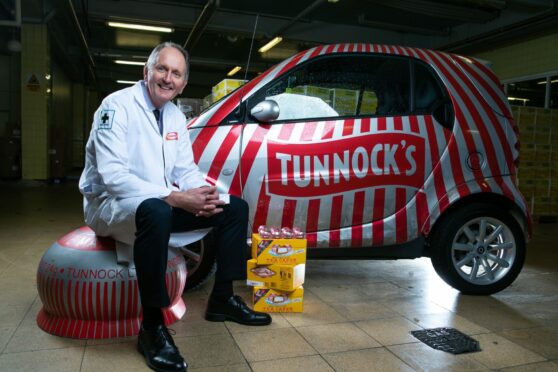 Fergus Loudon with the teacake Smart car at Tunnock’s in Uddingston