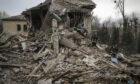 Ukrainian firefighters work at a damaged hospital maternity ward in Vilniansk last week