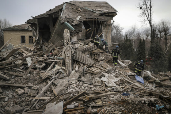 Ukrainian firefighters work at a damaged hospital maternity ward in Vilniansk last week