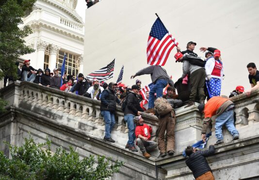 Rioters storm the Capitol in January 2021