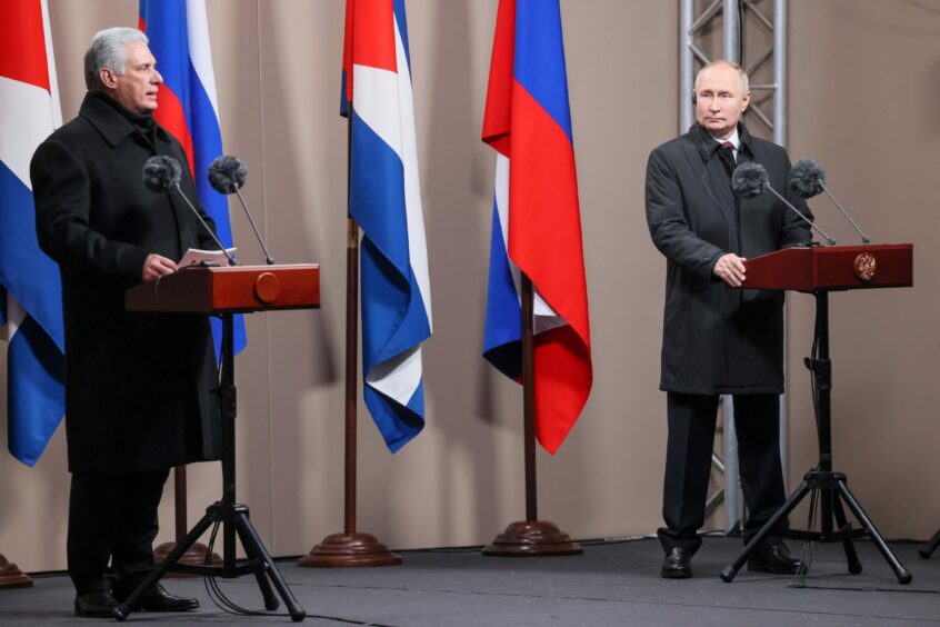 DiazCanel and Putin on November 22 as they unveil statue of Fidel Castro in Moscow