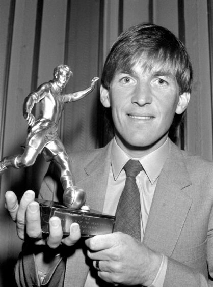 Kenny with the award he received from Pele in 1983