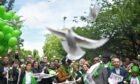 Doves are released outside St Helen’s church in London as part of a service in 2019 to mark the two-year anniversary of the Grenfell fire