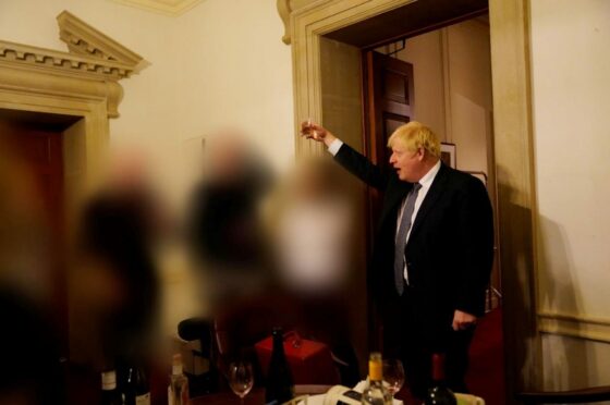 Boris Johnson makes a toast at one of the Whitehall parties during lockdown that helped usher him out of Downing Street in September.