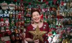 Lyndsey McDermott shows off some of the stars and baubles at her Tinsel & Tartan shop in Stirling.