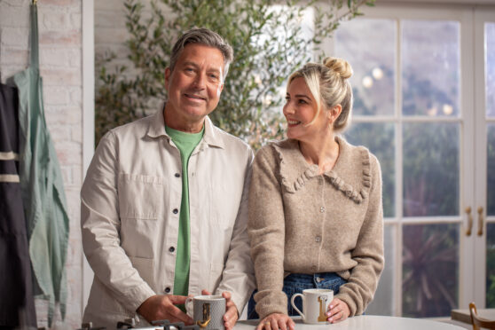 John Torode and Lisa Faulkner chill out in the kitchen