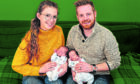 Charli and husband Hayden with twins Alfie, left, and Teddy at home in Moffat
