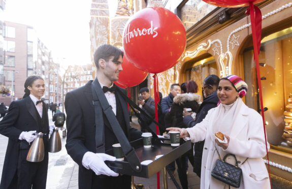 Shoppers outside Harrods in London before the start of the Boxing Day sales