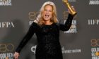 Jennifer Coolidge with her Golden Globe at the awards
