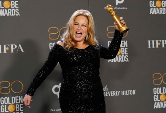 Jennifer Coolidge with her Golden Globe at the awards