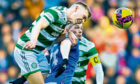 Alistair Johnston challenges Ryan Kent during his impressive Old Firm debut