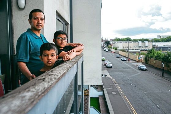 Abhijeet Kadwe and sons Kiaan and Advay at their Glasgow flat.